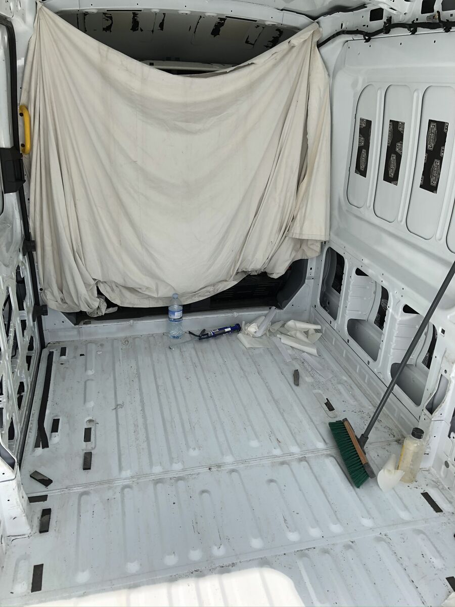 Sound deadening mats applied to bare metal panels